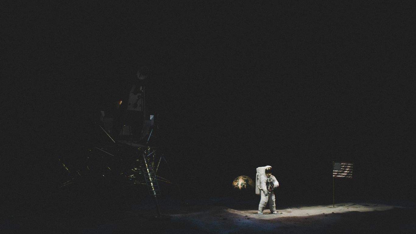 astronaut beside spaceship