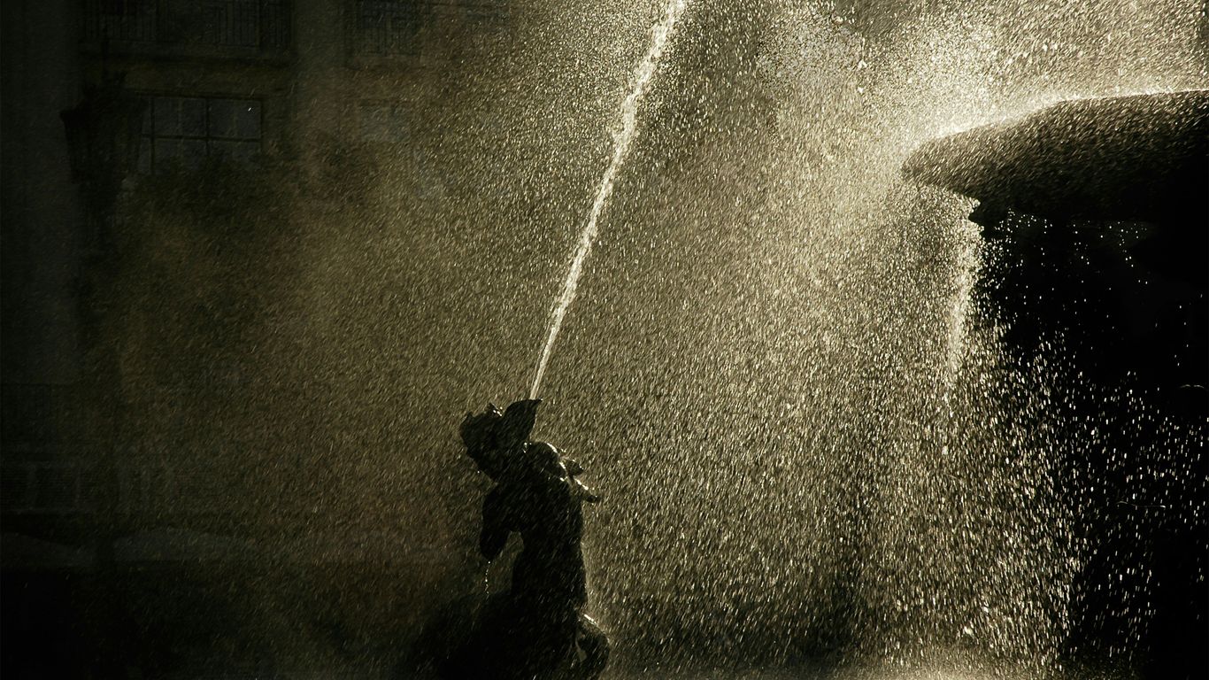 water fountain in grayscale photography