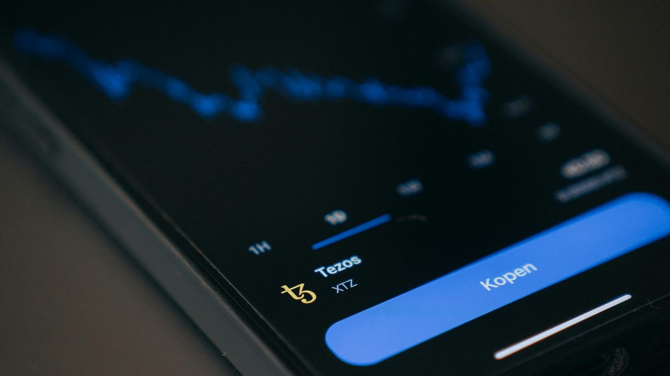 A smartphone displaying a cryptocurrency market chart and options.