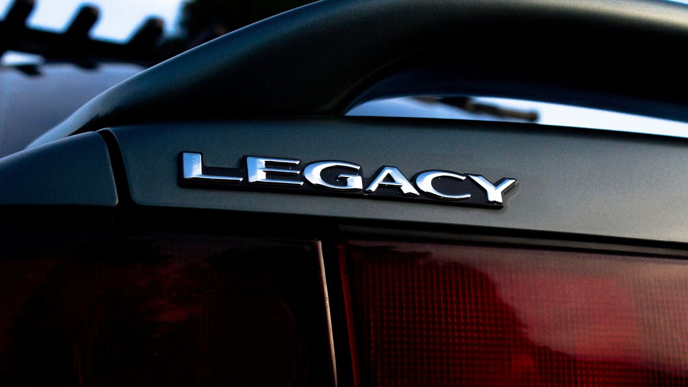 black and red car in close up photography