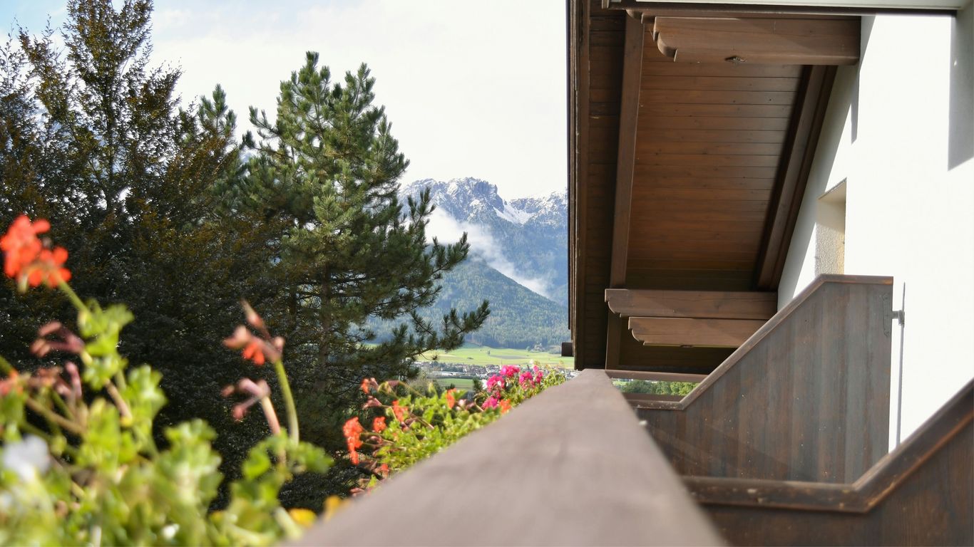 A view of the mountains from a porch