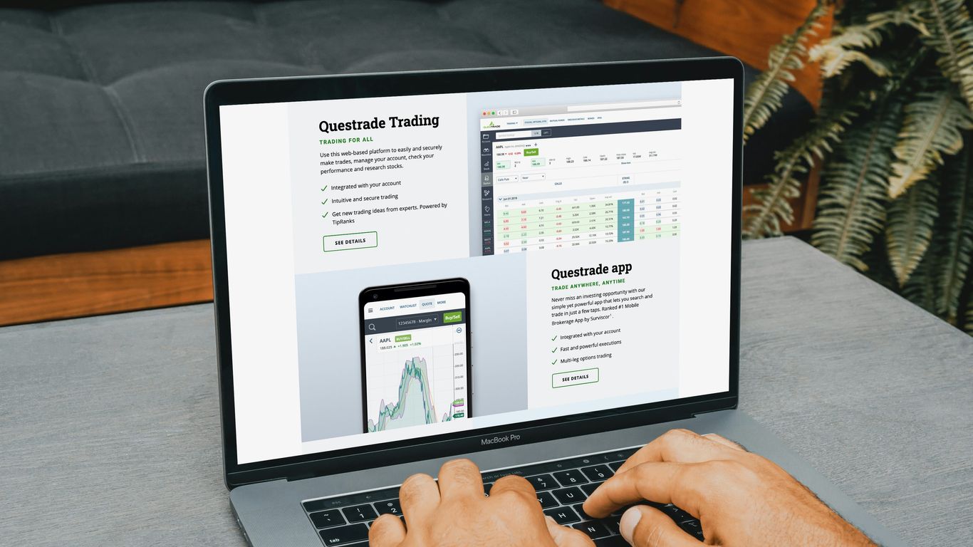 A person using a laptop to view trading information online.