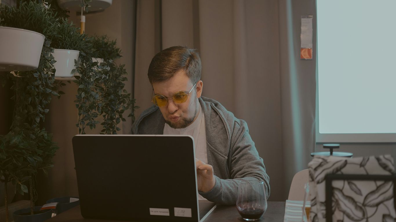 man working on laptop