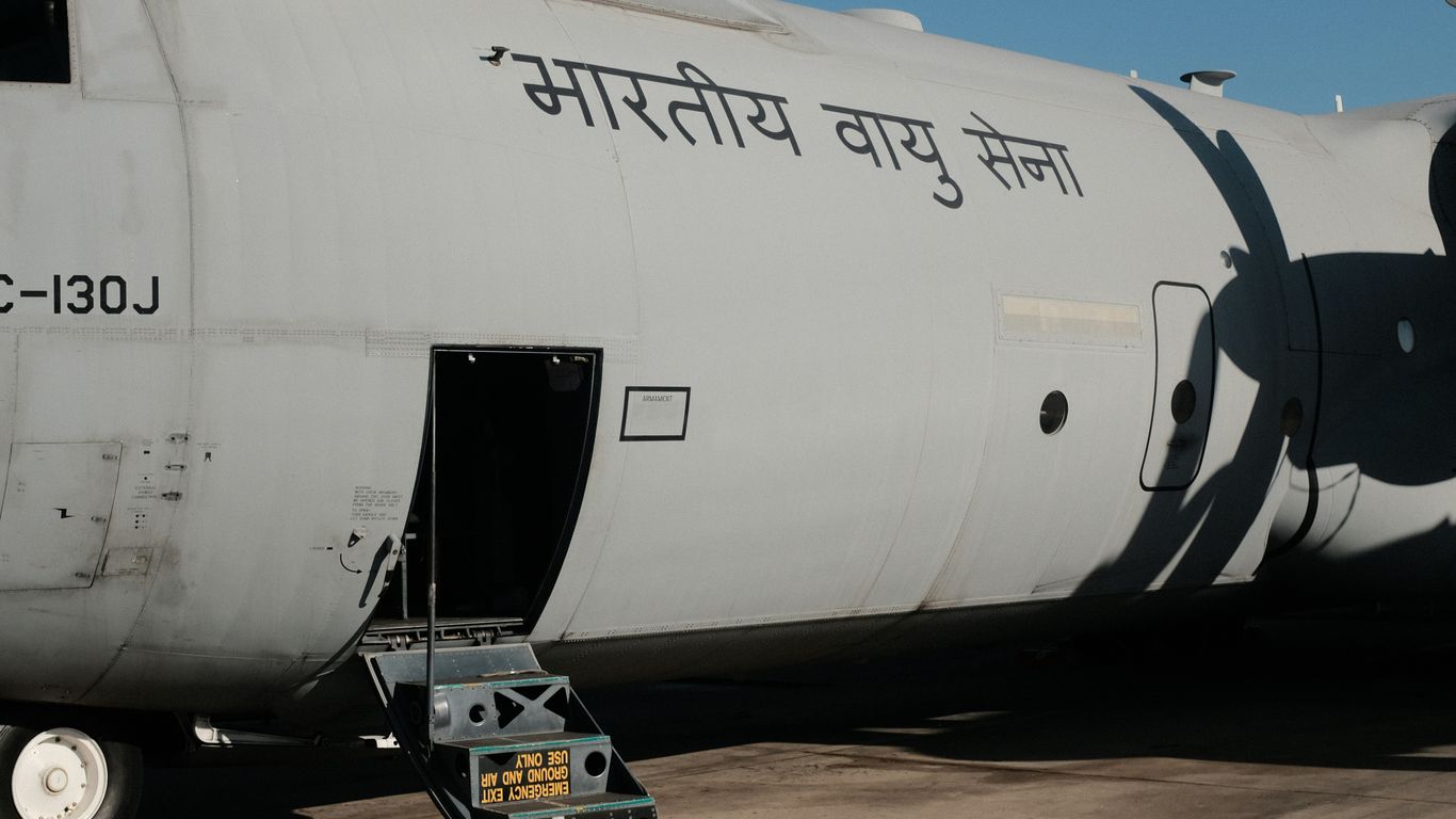 a large jetliner sitting on top of an airport tarmac