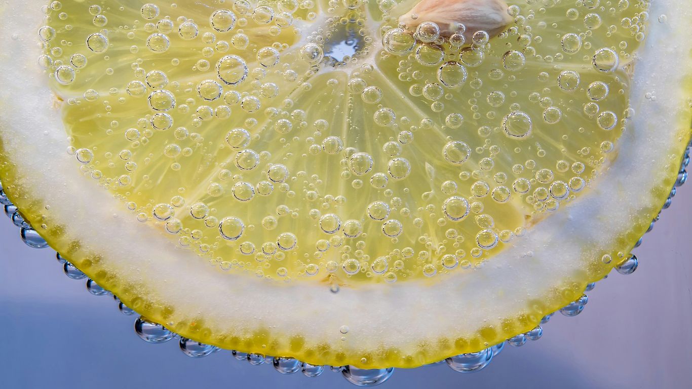 yellow lemon with water droplets