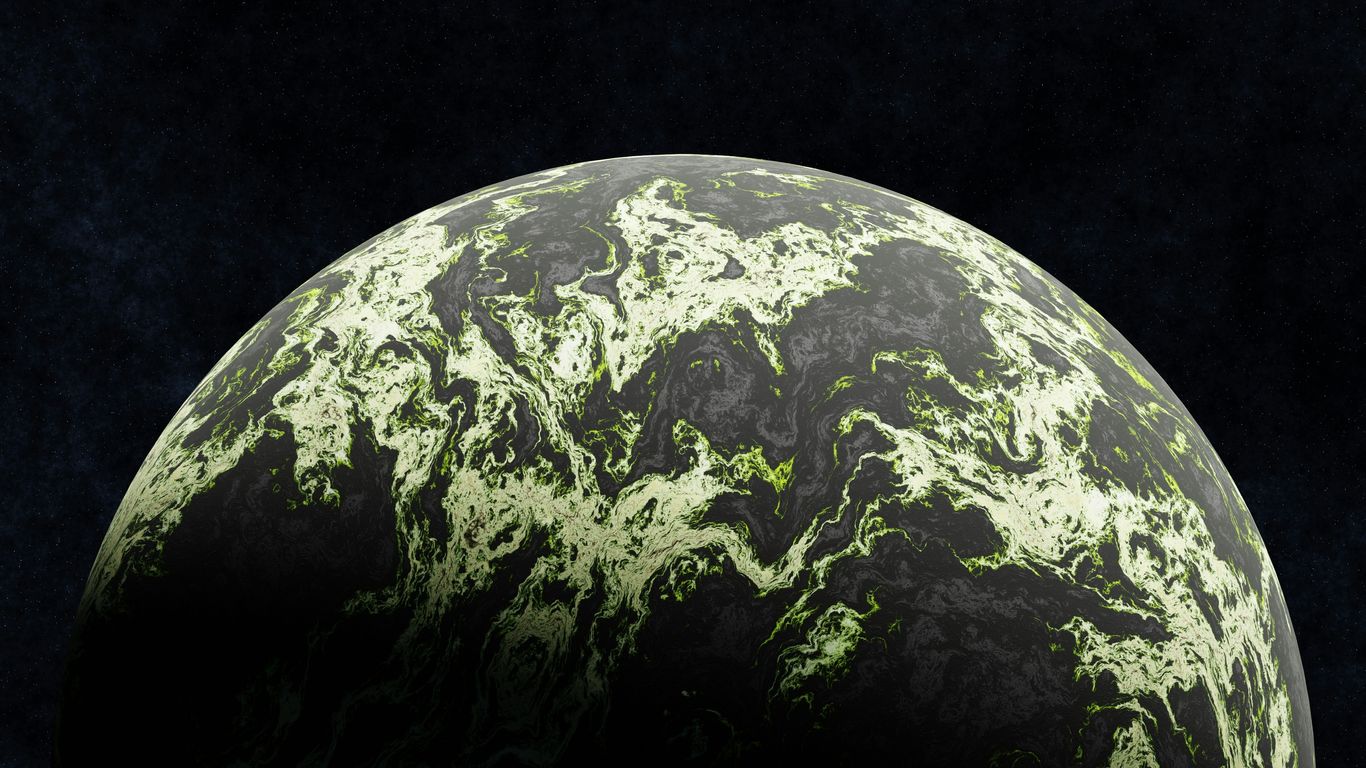 A green and black object with a black background