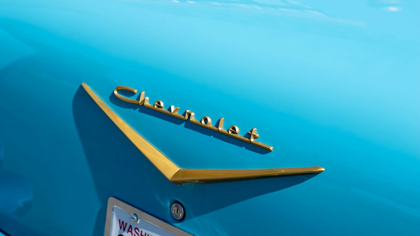 white and blue wooden signage on blue sea