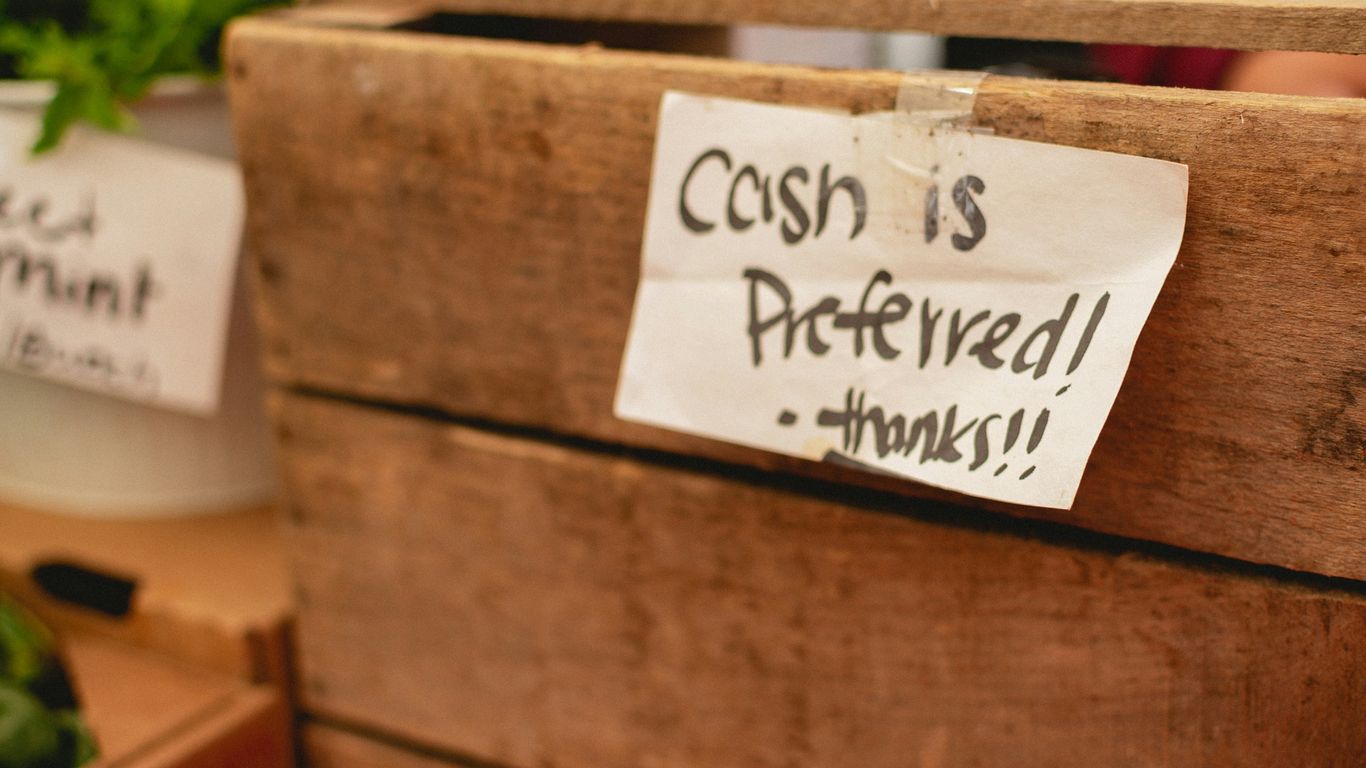 a close up of a wooden box with a sign on it
