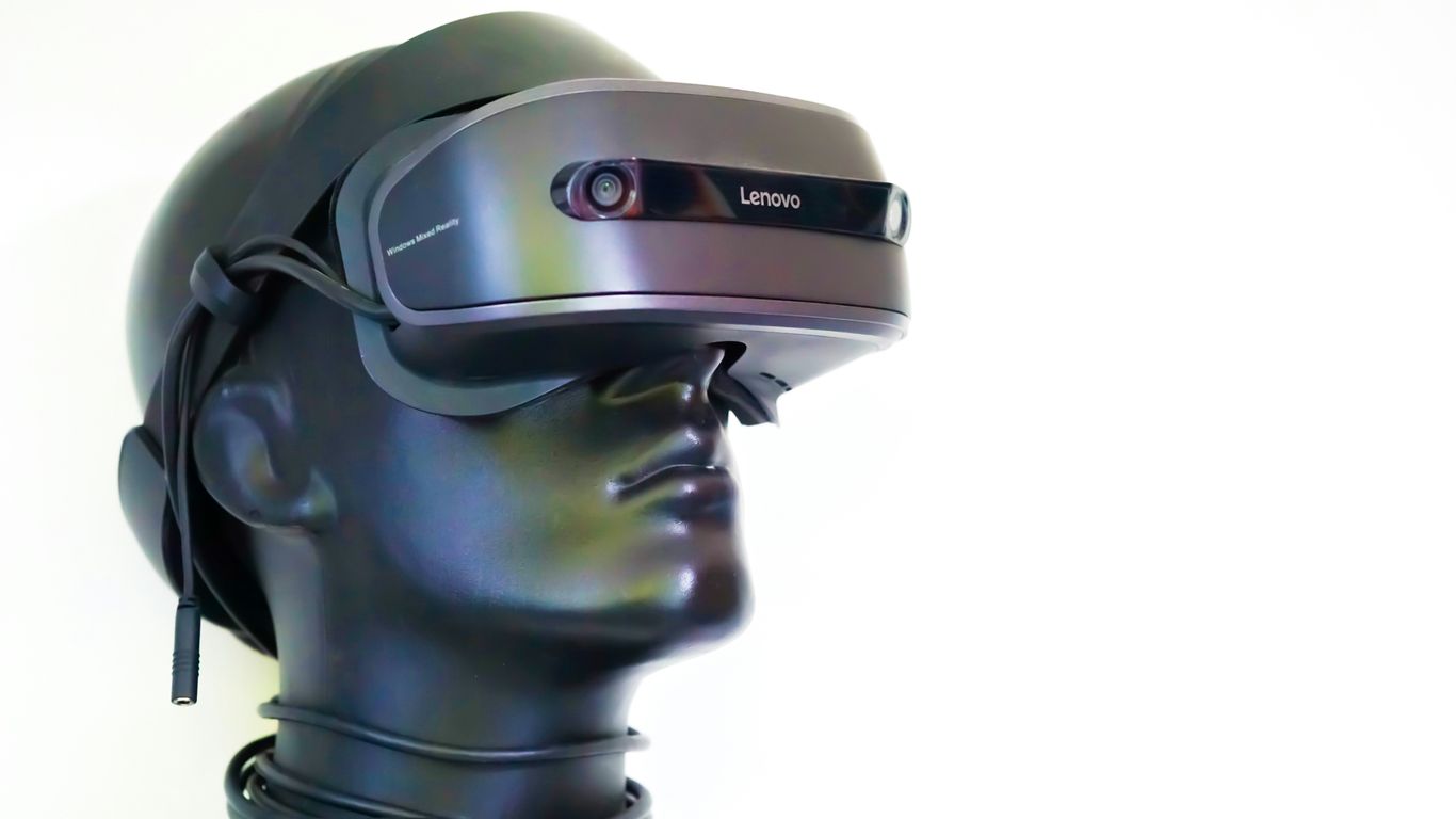 black and gray robot with goggles