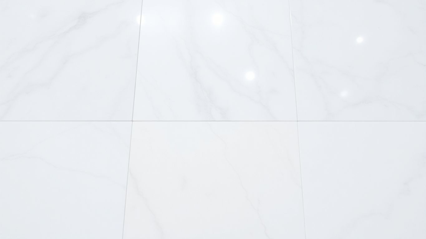 Polished white pearl marble tiles with subtle veining.