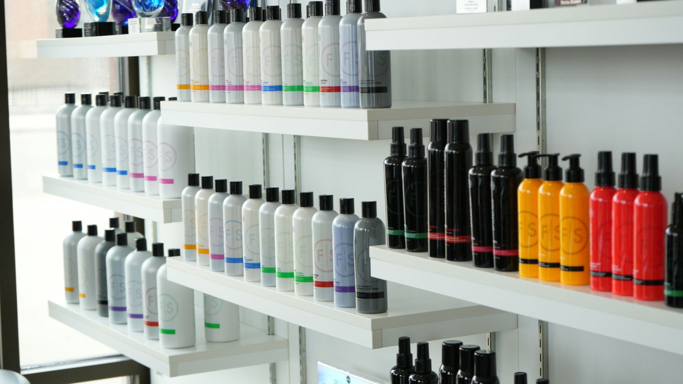 Hair products are neatly displayed on shelves.