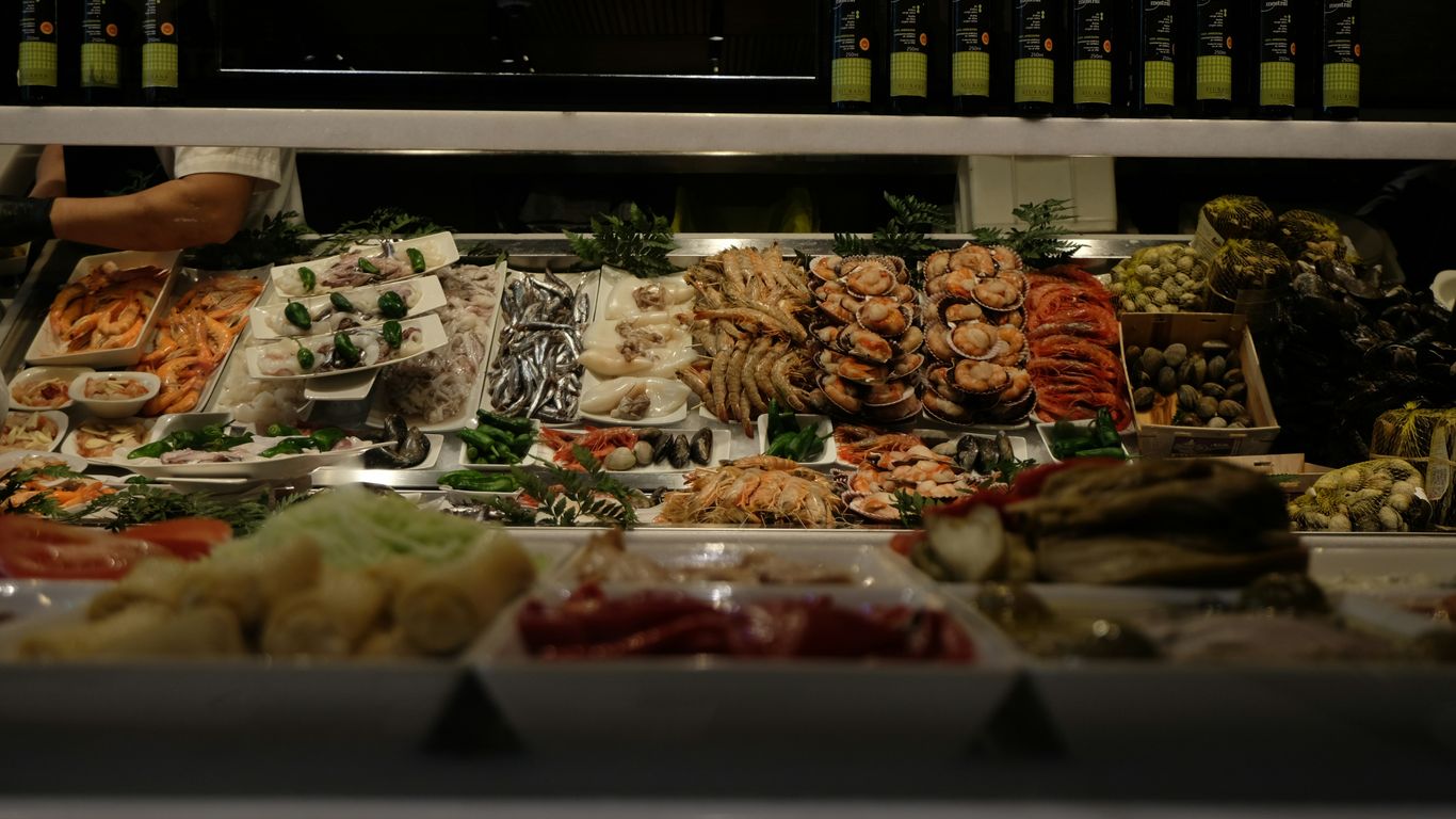 a display case filled with lots of different types of food
