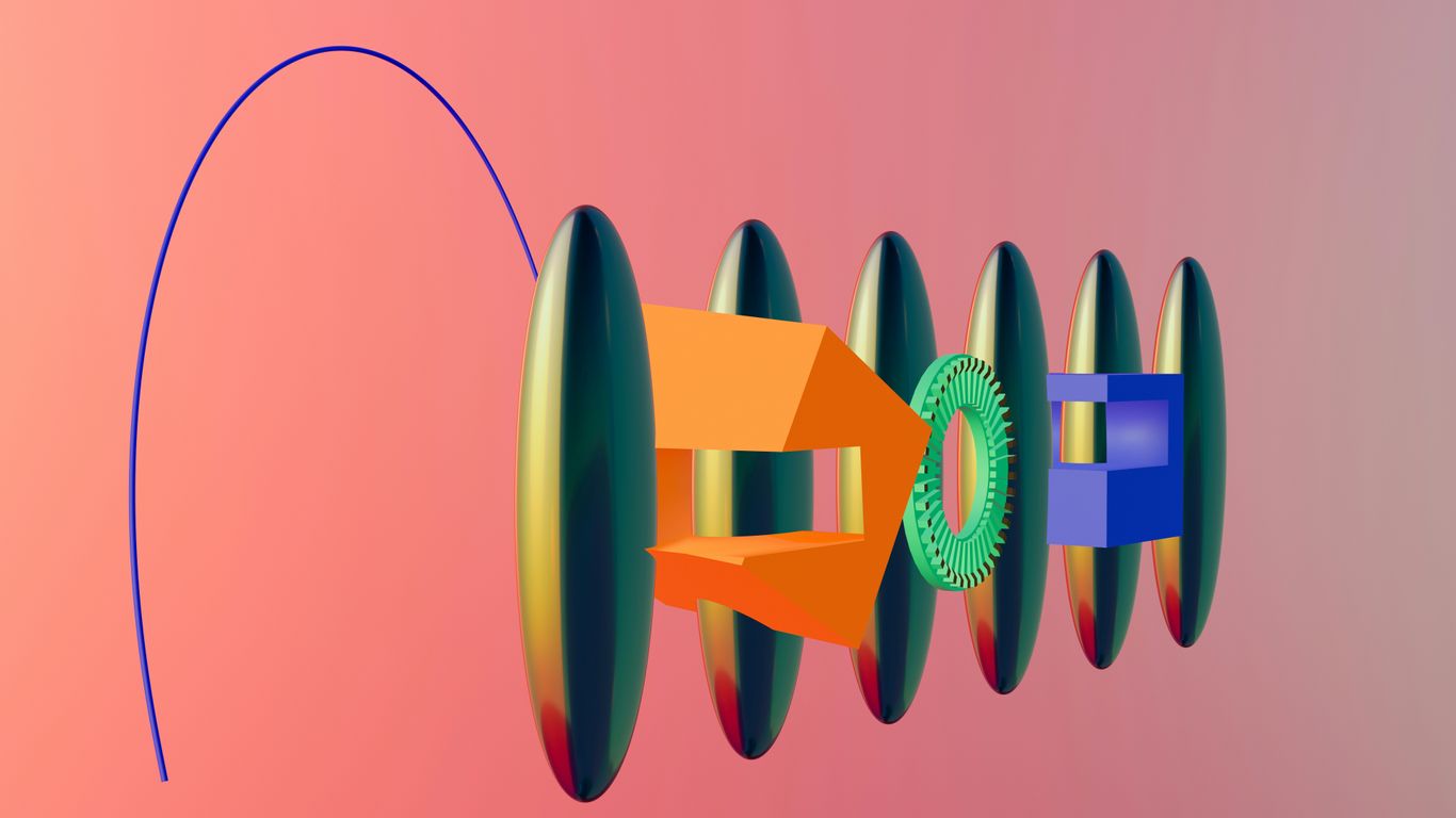a bunch of different colored objects on a pink background