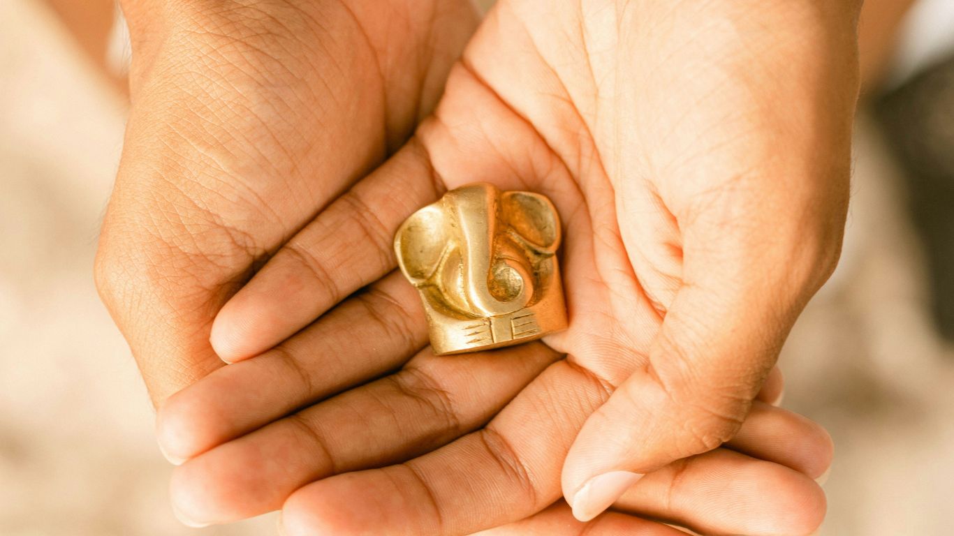 a person holding a coin
