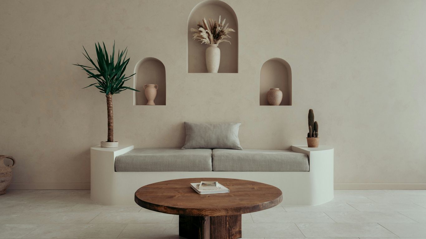 a living room with a couch and a table