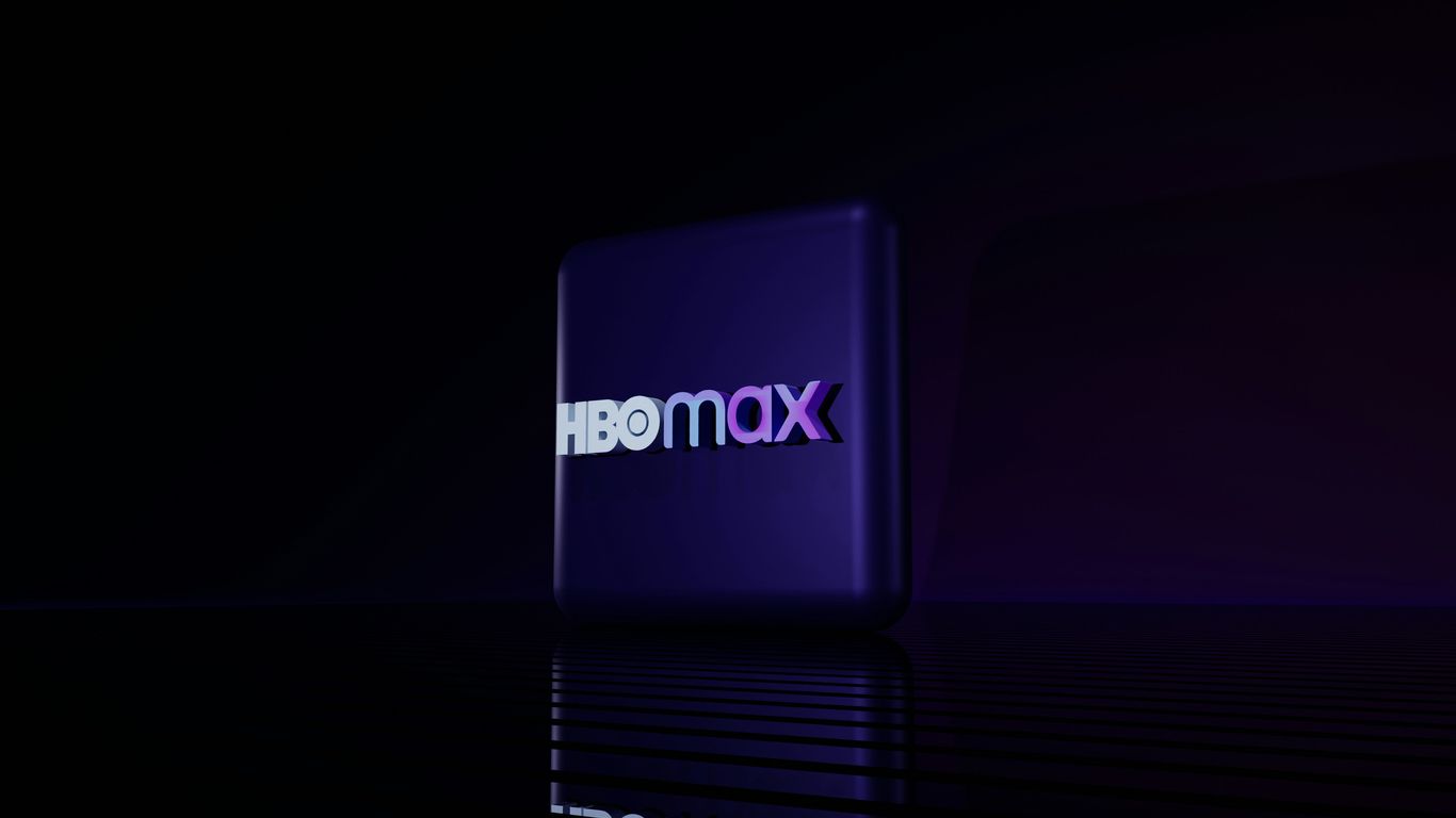 Hbo max logo on a dark reflective surface