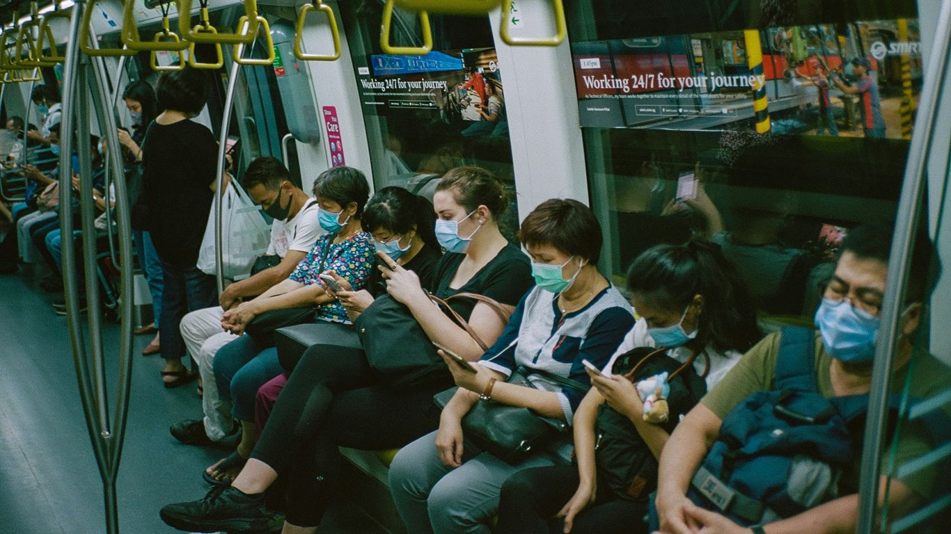 people sitting on train seat