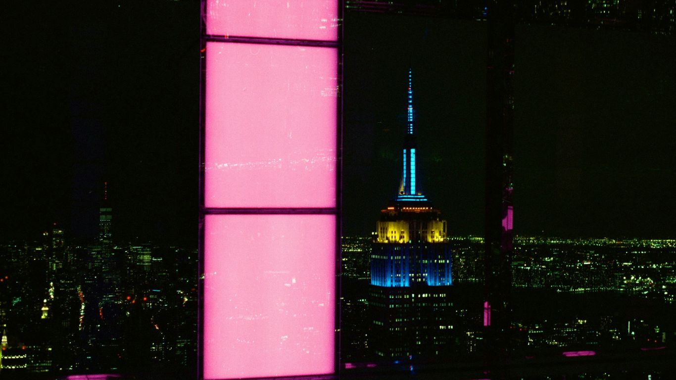 a view of a city at night from a tall building