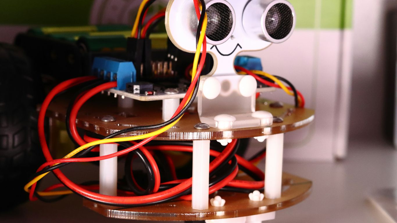 a robot made out of electronics and wires