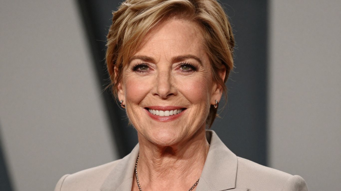 [Catherine O'Hara] smiling warmly in a photographic portrait.