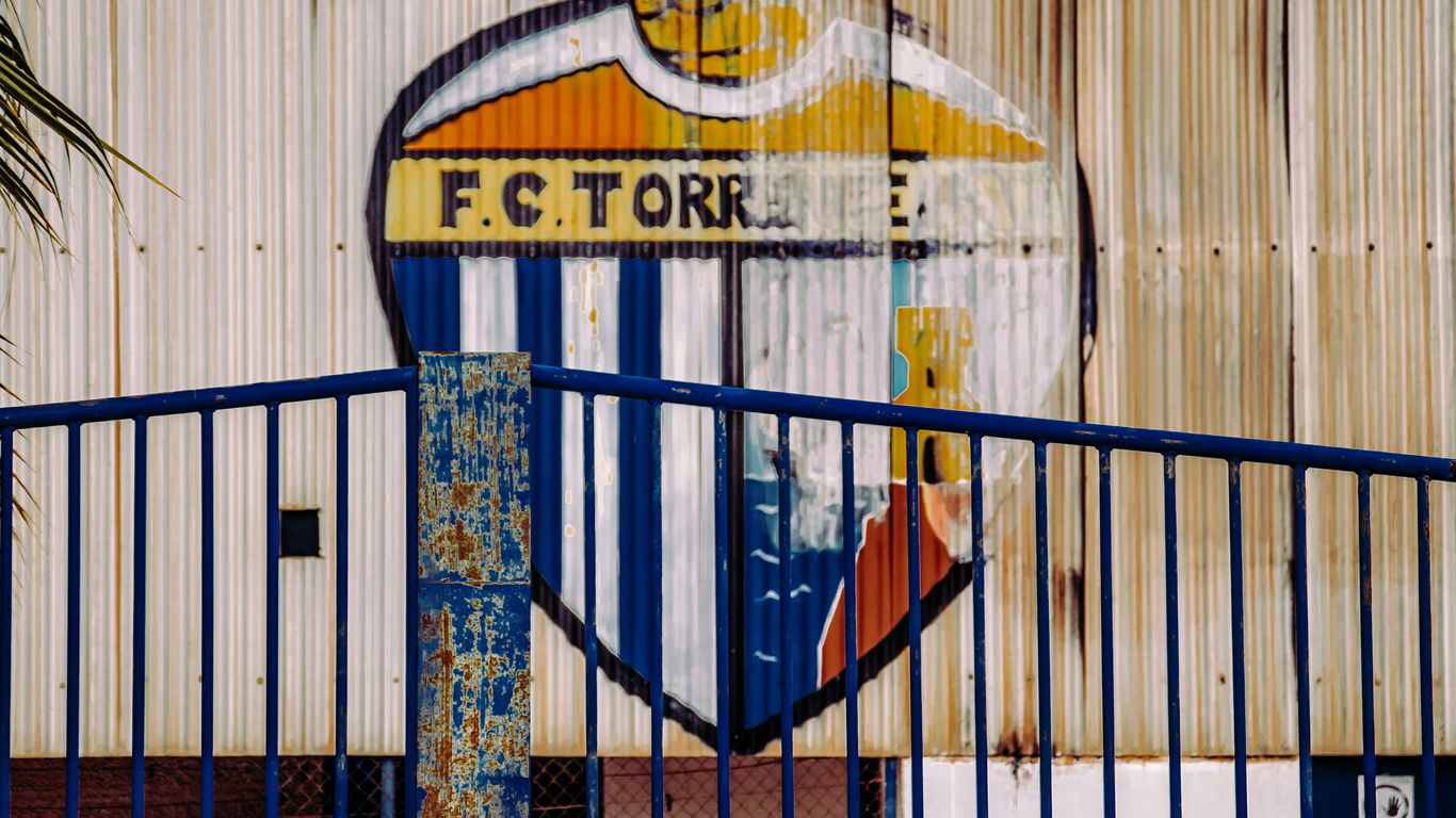blue and yellow metal gate