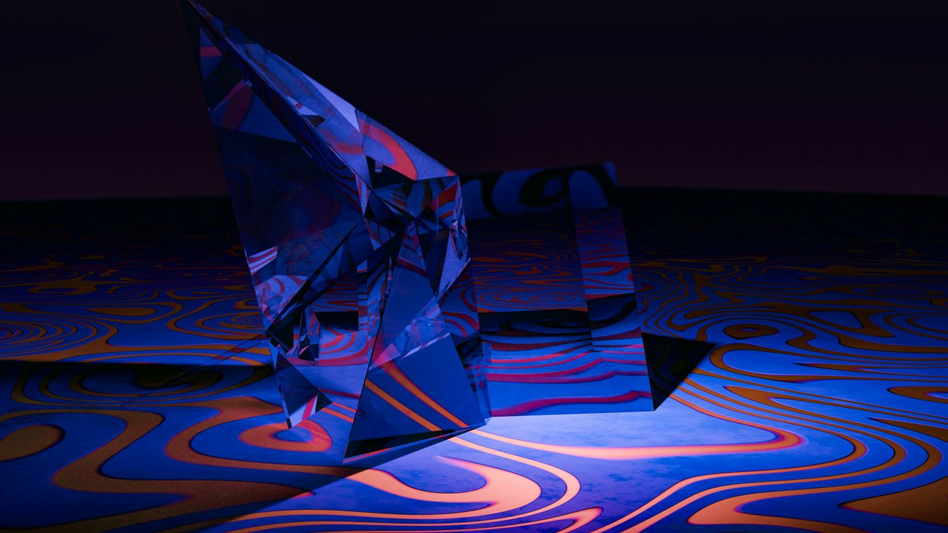 A blue origami bird sitting on top of a table