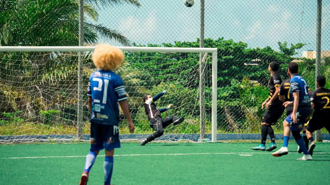 a group of young men playing a game of soccer