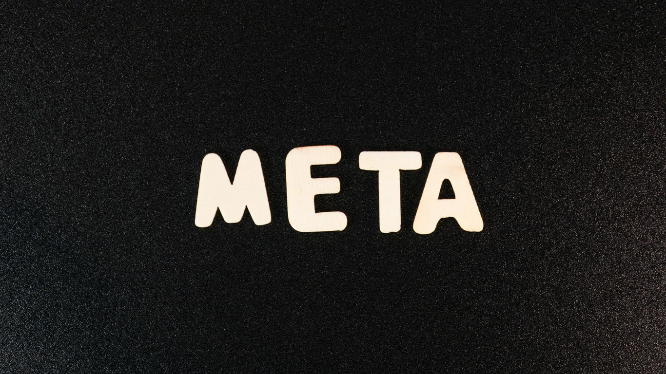 a close up of a black surface with white letters