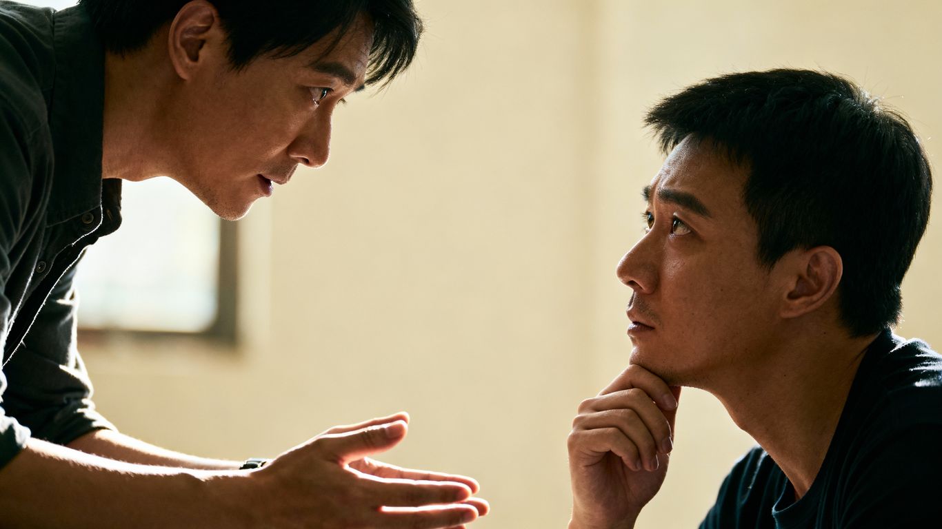 Two people in a difficult but respectful conversation.