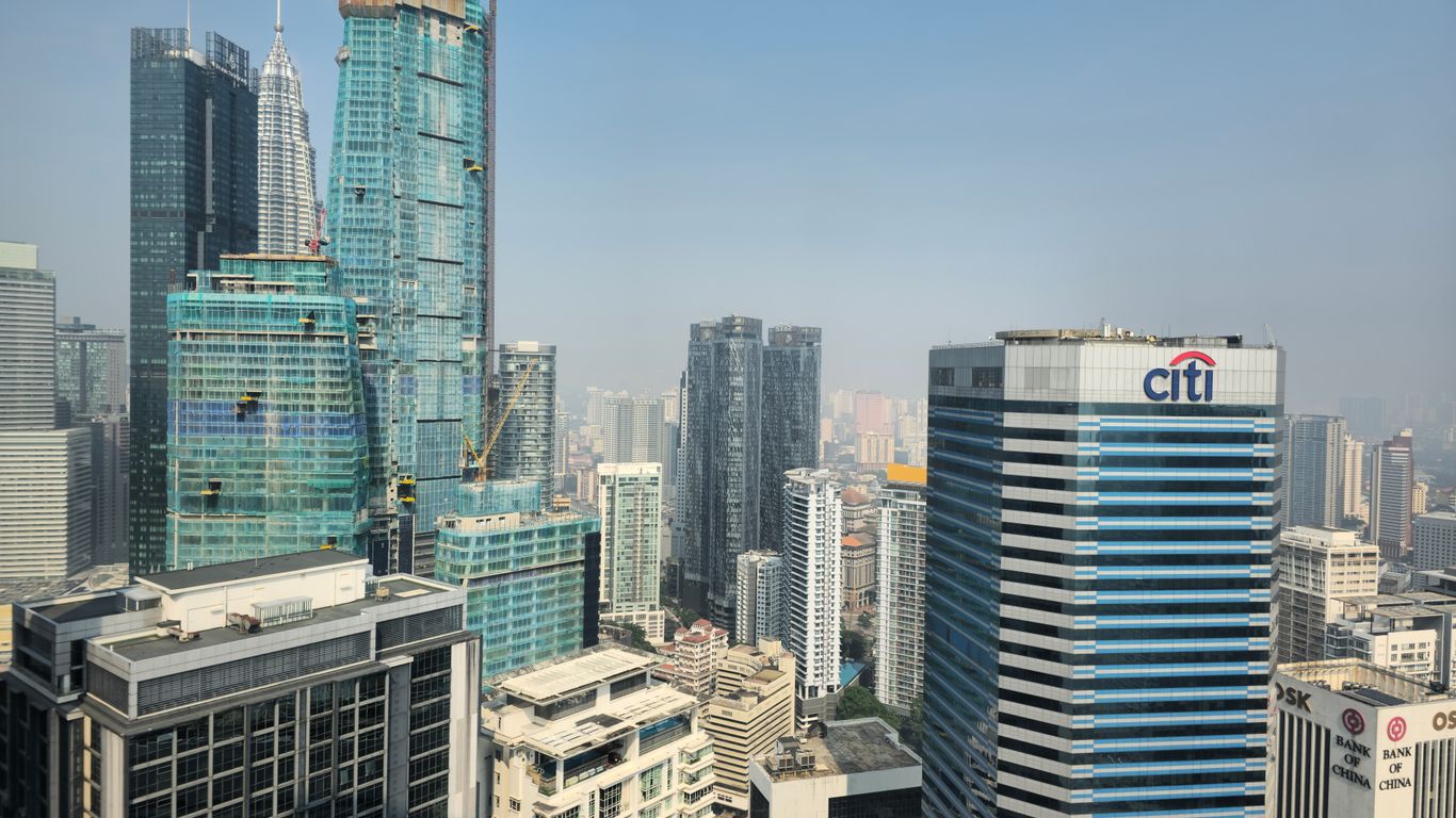 a view of a city with skyscrapers in the foreground