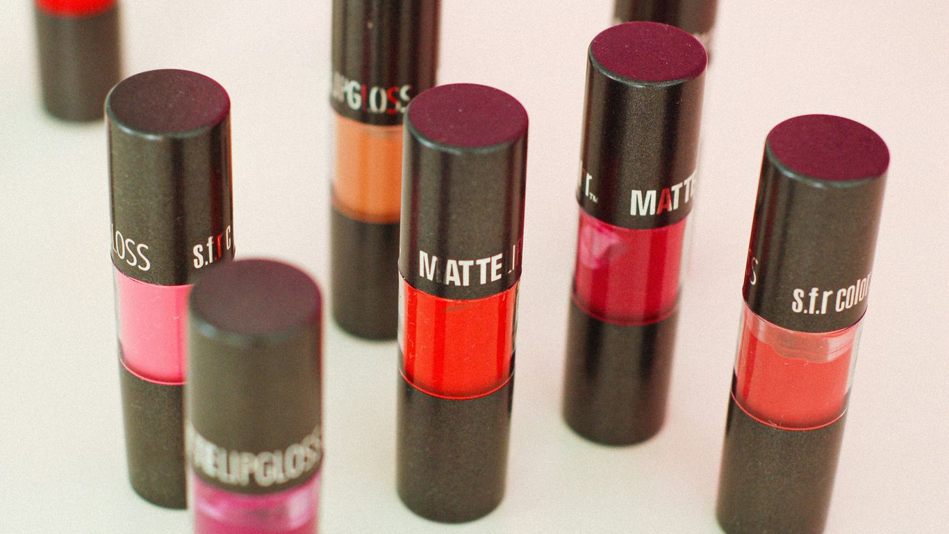 pink and black lipstick bottles