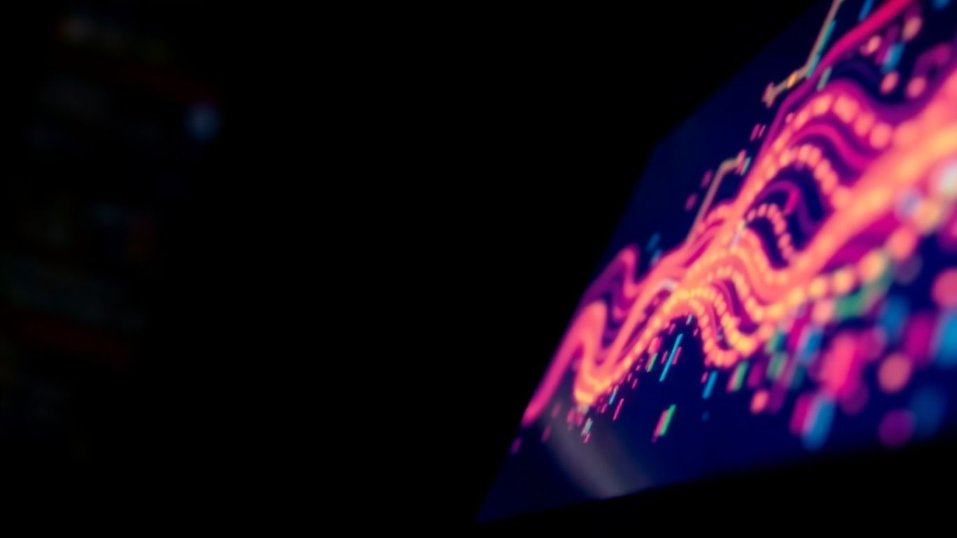 Abstract data streams glowing on a computer screen.