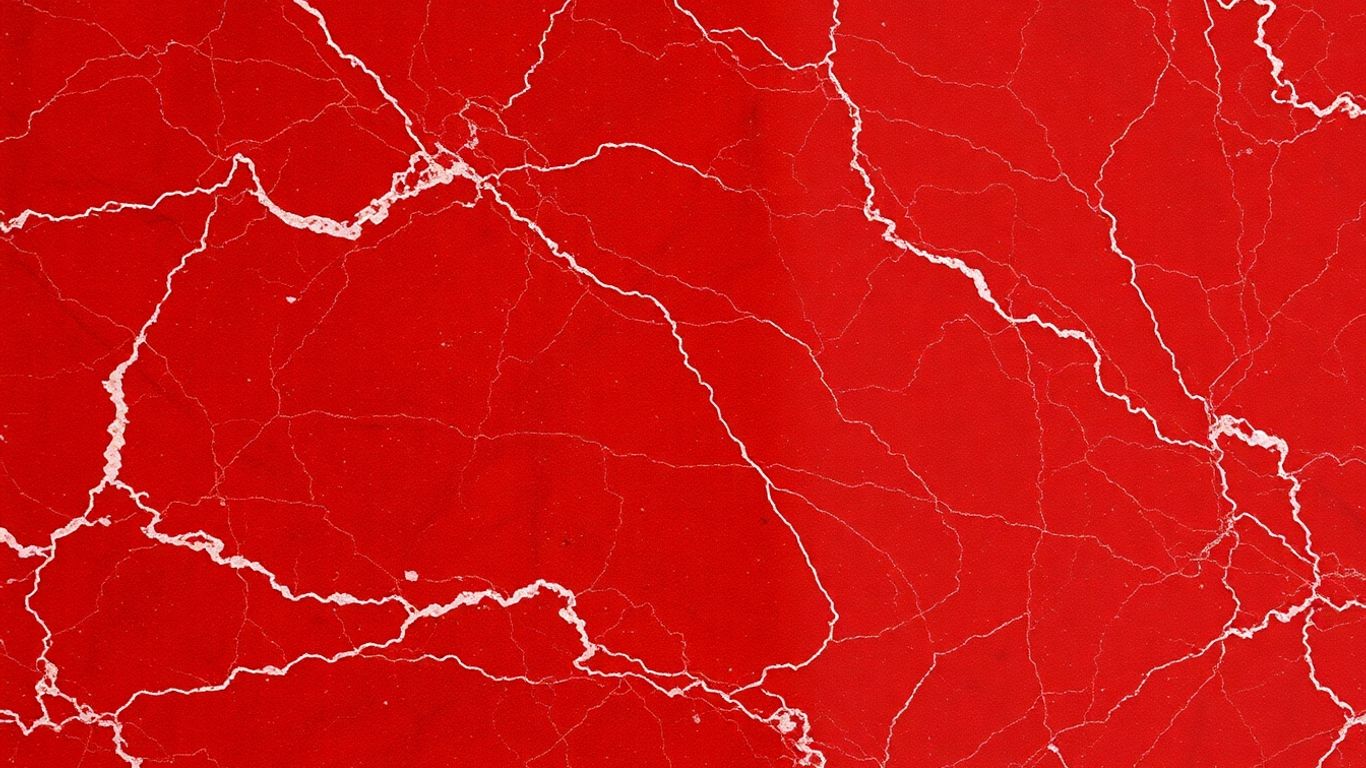 Polished Rojo Alicante marble with deep red veins.