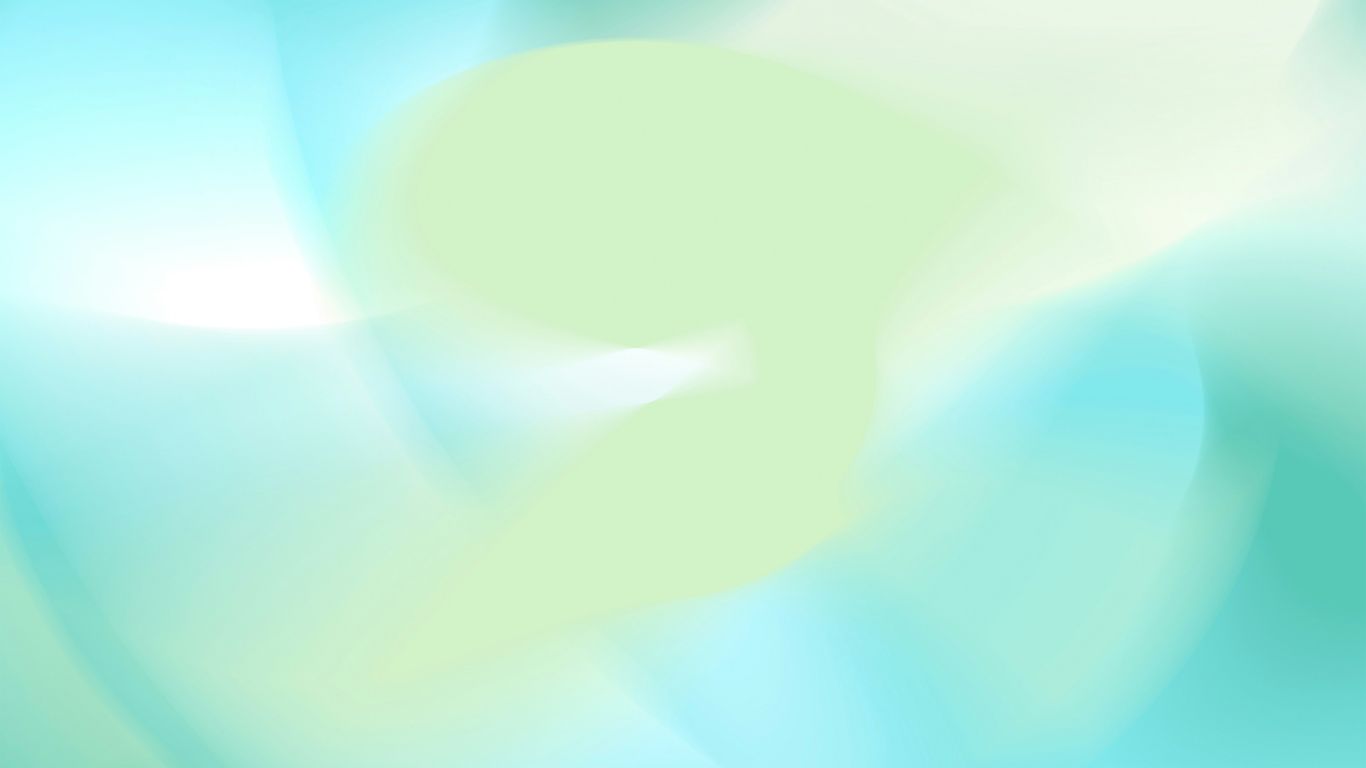 A blurry image of a blue and green background