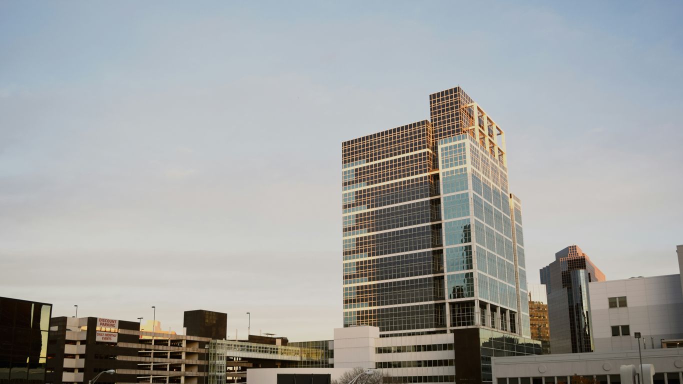 architectural photography of white and brown concrete building