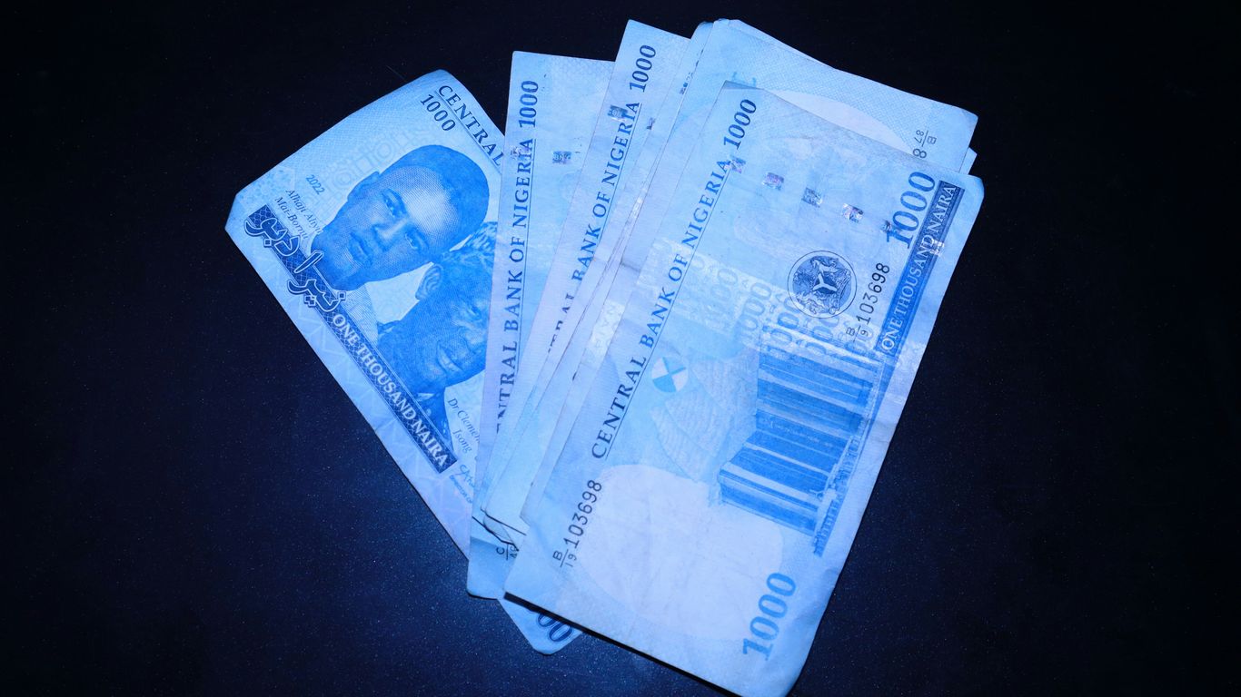 a bunch of money sitting on top of a table