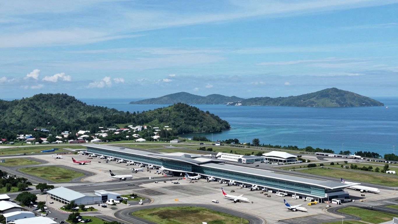 Labuan Bajo Airport aerial view with surrounding natural beauty.
