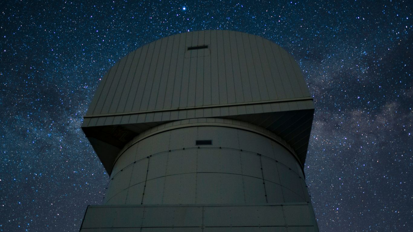 white concrete building under blue sky during daytime