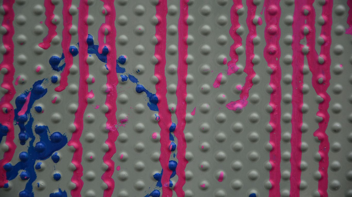 blue beads on pink plastic container