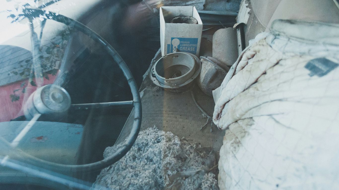 black car steering wheel close-up photography