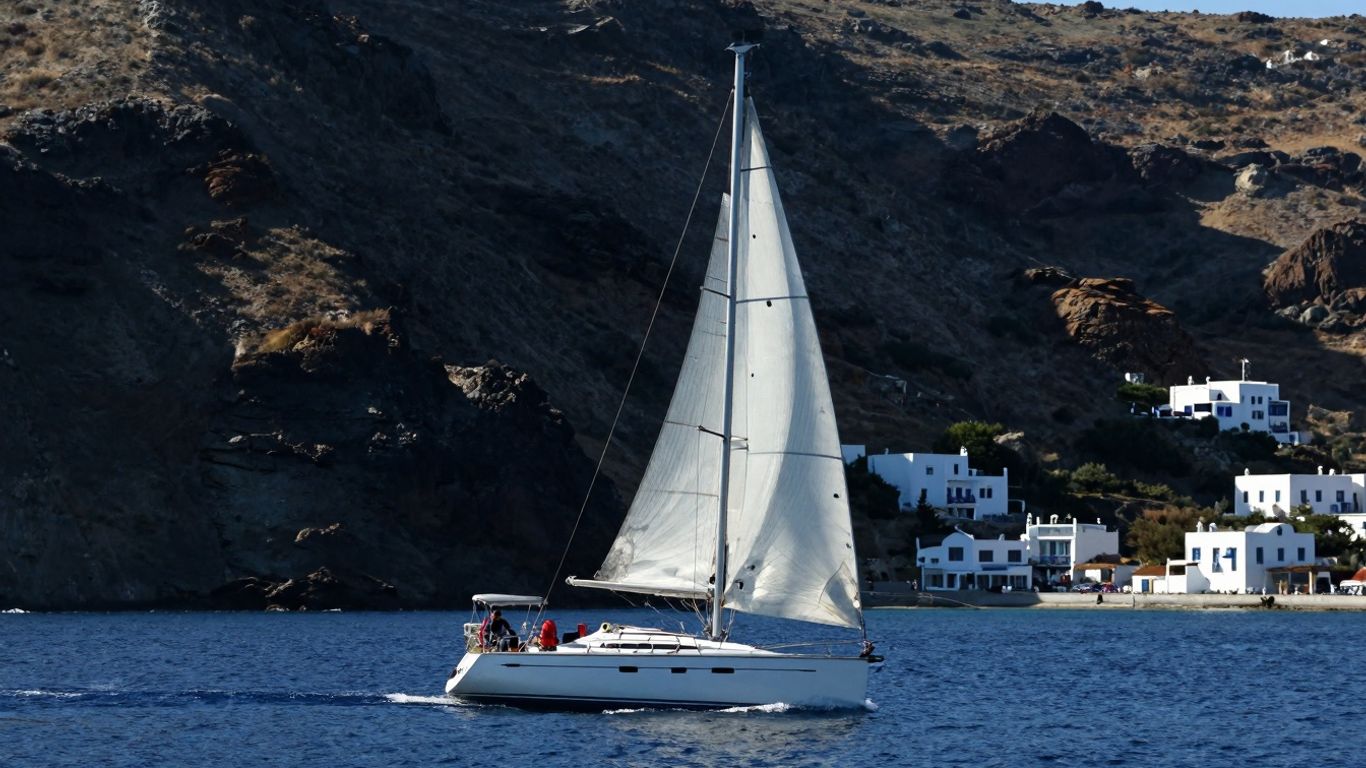 Sailboat on blue water near Greek coast