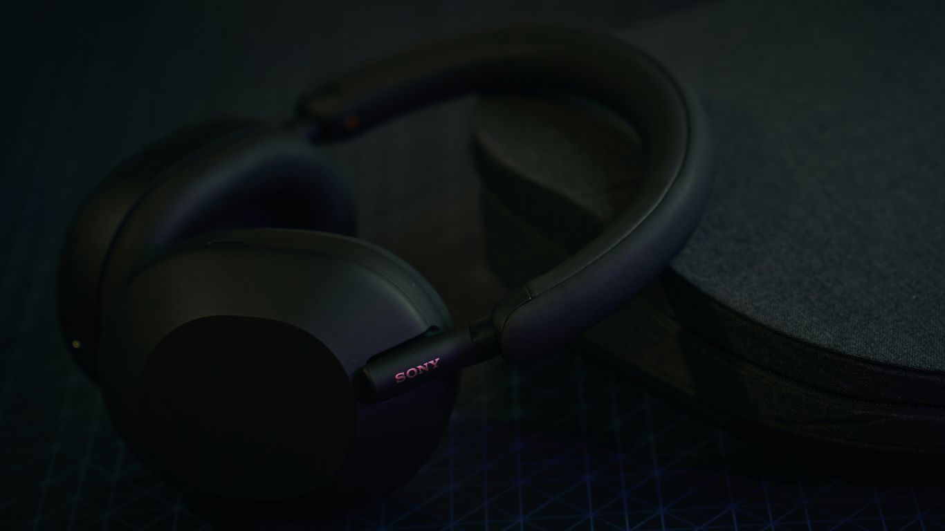 a pair of headphones sitting on top of a table