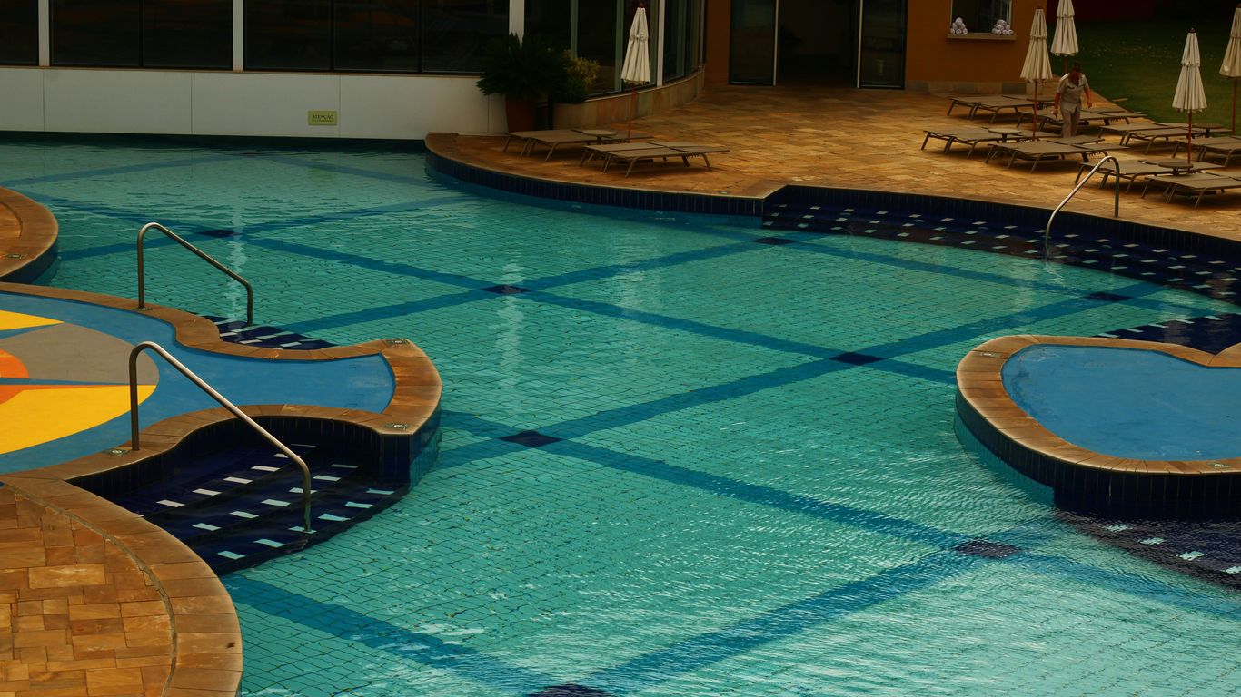 A large swimming pool in a large building