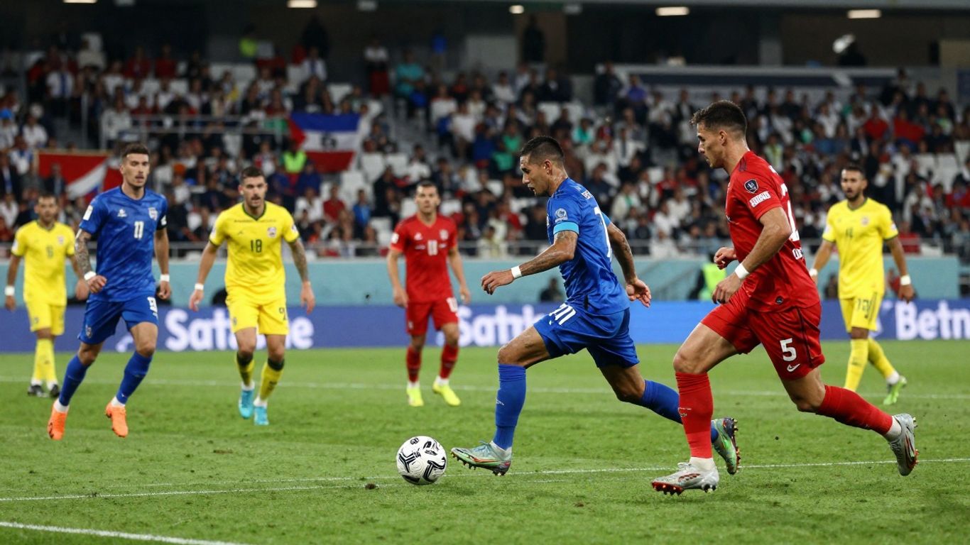 Football match in progress with players on the field.