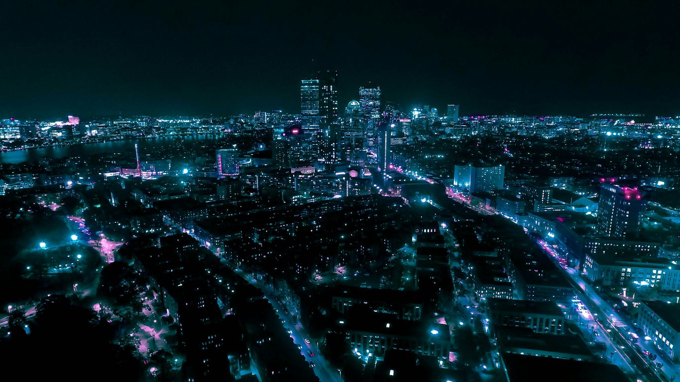 an aerial view of a city at night