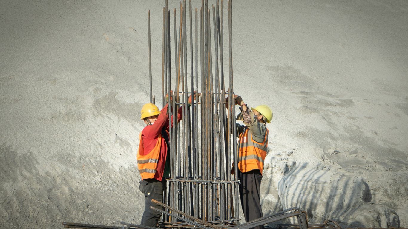 two men working on a construction site