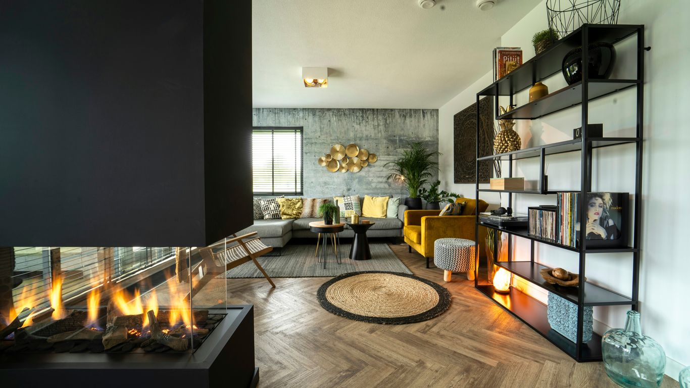 black fireplace near black flat screen tv