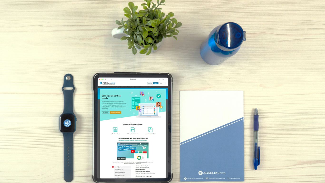 a tablet computer sitting on top of a wooden table