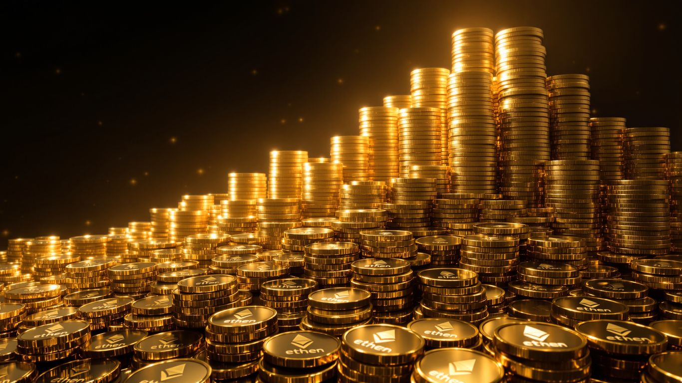Ether coins stacked high, illuminated by upward light.