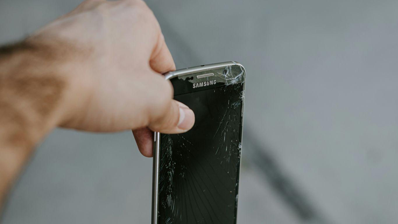 person holding black samsung android smartphone